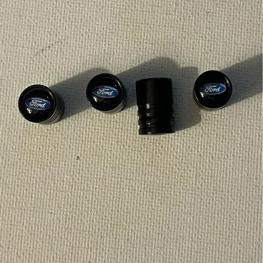 Ford valve Stem capsโin Black set of 4โNWT
